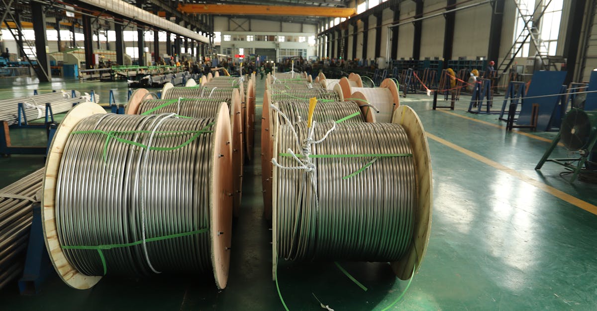 view of large cable reels in an industrial manufacturing facility showcasing production scale
